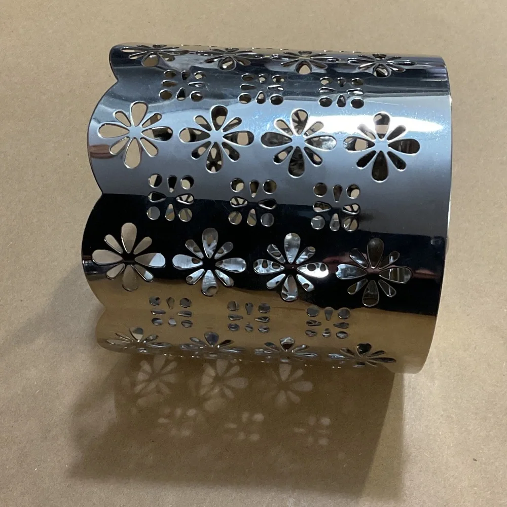 Elegant Silver Floral Cutout Candle Holder